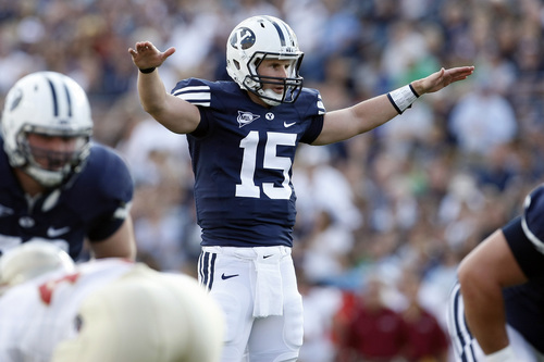 Photo by Chris Detrick  |  The Salt Lake Tribune 
Brigham Young's Max Hall #15 quiets down the stadium during the first half of the game against Florida State at LaVell Edwards Saturday September 19, 2009. BYU lost the game 54-28.