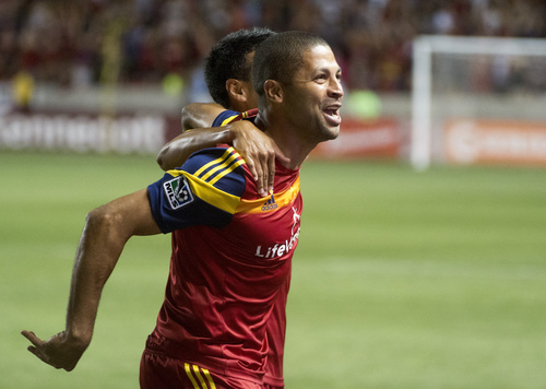 Rick Egan  |  The Salt Lake Tribune

Real Salt Lake forward Alvaro Saboru (15) celebrates with Javier Morales (11), after giving Real Salt Lake a 2-1 lead with a goal late in the second half, in MLS action, Real Salt Lake vs. FC Dallas , at Rio Tinto Stadium, Thursday, September 6, 2014