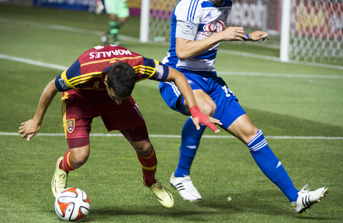 Rick Egan  |  The Salt Lake Tribune

Real Salt Lake midfielder Javier Morales (11) tries to keep control of the ball, as he is bumped by FC Dallas defender Matt Hedges (24), in MLS action, Real Salt Lake vs. FC Dallas , at Rio Tinto Stadium, Thursday, September 6, 2014
