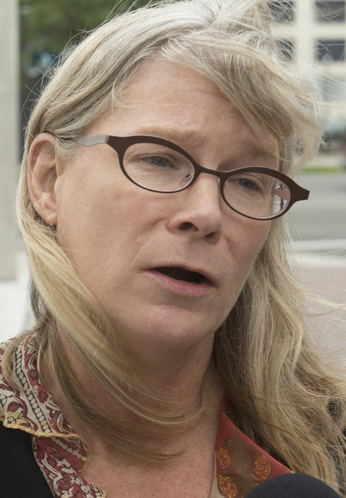 Rick Egan  |  The Salt Lake Tribune

Former Tribune staffer Joan O'Brien speaks to reporters outside the courthouse after arguments in the Citizens for Two Voices' lawsuit challenge a new business deal between The Salt Lake Tribune and the Deseret News.   Monday, September 8, 2014