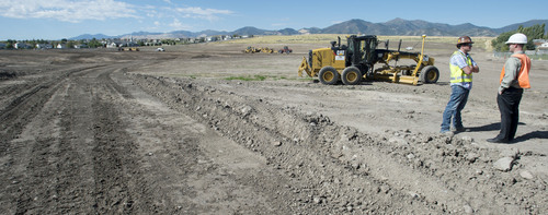 Steve Griffin  |  The Salt Lake Tribune

Salt Lake County Parks and Recreation begins construction for Phase II of Lodestone Regional Park in Kearns, Monday, September 8, 2014.  Located in Kearns Township and West Valley City, Lodestone Regional Park is one of three regional parks funded by the $47 million Park Bond, authorized by voters in 2012.