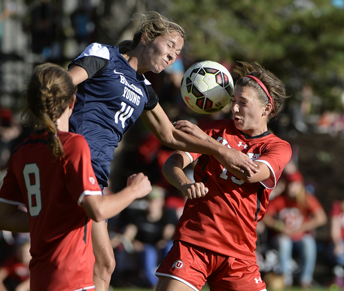 Scott Sommerdorf   |  The Salt Lake Tribune
BYU's Annie Amos, left, and Utah's Natalie Vukic go up for a header on a Utah corner kick during second half play. Katie Taylor scored on a second half penalty kick, and Utah women's soccer defeated BYU 1-0 in Salt Lake City, Friday, September 5, 2014.