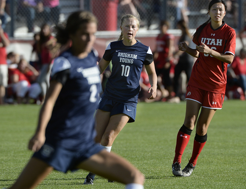 Scott Sommerdorf   |  The Salt Lake Tribune
BYU's Elisabeth Phillips, center, during the match with Utah. Utah's Katie Taylor scored on a second half penalty kick, and Utah women's soccer defeated BYU 1-0 in Salt Lake City, Friday, September 5, 2014.