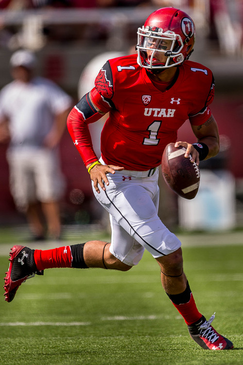 Trent Nelson  |  The Salt Lake Tribune
Utah Utes quarterback Kendal Thompson (1) runs the ball as Utah hosts Fresno State, college football at Rice-Eccles Stadium Saturday September 6, 2014.