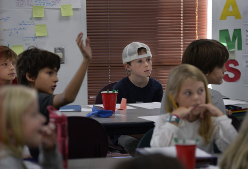 Scott Sommerdorf   |  The Salt Lake Tribune
Cole Urmann, center, switched to Salt Lake Arts Academy because the fifth-grade classes at his old school, Wasatch Elementary, were too large. Here he participates in Dan Armstrong's Math5 class at Salt Lake Arts Academy, Wednesday, September 10, 2014.