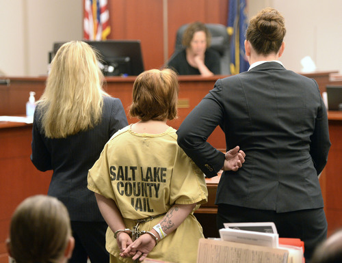 Al Hartmann  |  The Salt Lake Tribune
Alicia Englert, accused of throwing her baby in the trash earlier this month, makes her initial appearance in Judge Ann Boyden's courtroom in Salt Lake City Wednesday Septmeber 10.  Her defense lawyers Susanne Gustin, left, Melissa Fulkerson, right. She is charged with attempted murder.