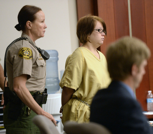 Al Hartmann  |  The Salt Lake Tribune
Alicia Englert, accused of throwing her baby in the trash earlier this month, makes her initial appearance in Judge Ann Boyden's courtroom in Salt Lake City Wednesday Septmeber 10.  She is charged with attempted murder.
