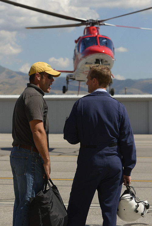 Leah Hogsten  |  The Salt Lake Tribune
l-r Life Flight pilot Pete Anderson learns down flow and up flow techniques after a flight over Salt Lake City's foothills with  NHZ's TopFlight's Tim Simmons. The Intermountain Life Flight team is training this week with HNZ TopFlight to enhance their already solid experience performing high-terrain and mountain rescues in Utah's back country and high elevations, Wednesday, September 10, 2014.