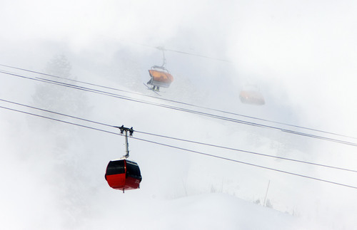 Steve Griffin | The Salt Lake Tribune

Skiers brave sub-zero temperatures as a gondola passes through clouds of man-made snow at the Canyons Resort in Park City, Utah Monday January 14, 2013.