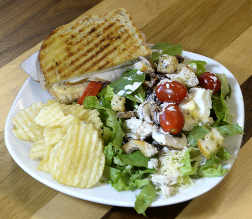 Rick Egan  |  The Salt Lake Tribune

Half Southwest Turkey Panini, and half Caesar Salad, at Plates and Palates, in Bountiful.