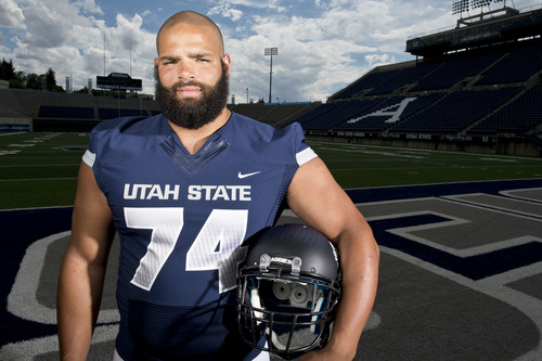 Lennie Mahler  |  The Salt Lake Tribune
Utah State lineman Kevin Whimpey poses for a portrait during media day press availability at Romney Stadium in Logan, Utah, Aug. 4, 2014.