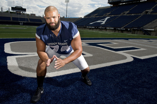 Lennie Mahler  |  The Salt Lake Tribune
Utah State lineman Kevin Whimpey poses for a portrait during media day press availability at Romney Stadium in Logan, Utah, Aug. 4, 2014.