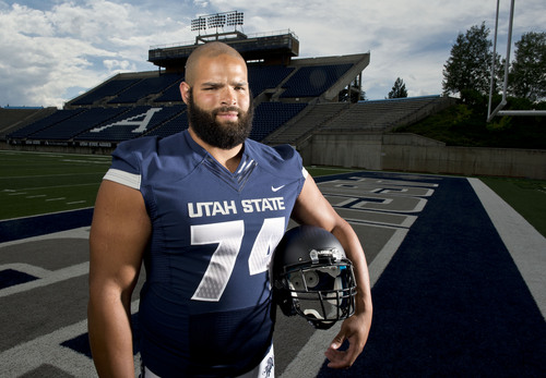 Lennie Mahler  |  The Salt Lake Tribune
Utah State lineman Kevin Whimpey poses for a portrait during media day press availability at Romney Stadium in Logan, Utah, Aug. 4, 2014.