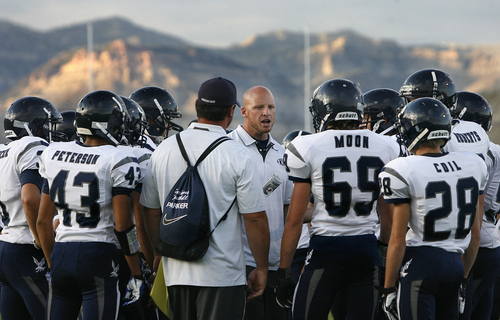 Scott Sommerdorf   |  The Salt Lake Tribune
Duchesne head coach Jerry Cowan talks with his team after pre-game drills. The Eagles would go on to an easy 35-0 win against Carbon High which ran their winning streak to 37 games, setting the Utah state record for consecutive wins, Friday, September 6, 2013.