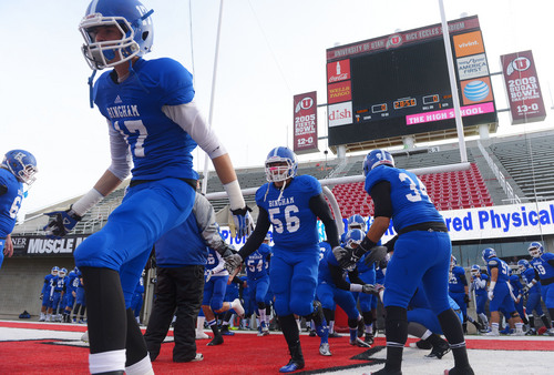 Steve Griffin  |  The Salt Lake Tribune


Bingham players take the field prior to the start of the 5A championship football game between Bingham and Brighton at Rice Eccles Stadium in Salt Lake City, Utah Friday, November 22, 2013.