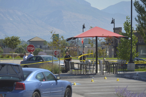 Chris Detrick  |  The Salt Lake Tribune
The scene outside of a Panda Express in Saratoga Springs Wednesday September 10, 2014.  A male -- who reportedly was seen wielding a samurai sword -- was shot and killed by police in Saratoga Springs on Wednesday morning.