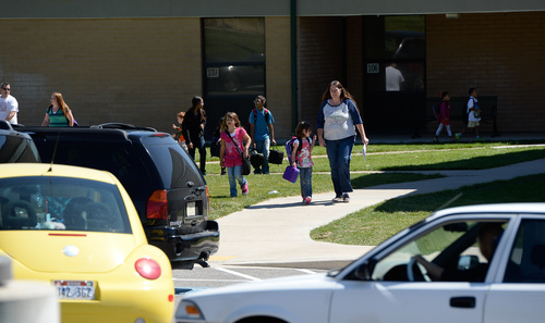 Francisco Kjolseth  |  The Salt Lake Tribune
Westbrook Elementary in Taylorsville lets out for the day on Friday afternoon following an incident the day before where 6th-grade teacher Michelle Ferguson- Montgomery, accidentally discharged her handgun in a school restroom.