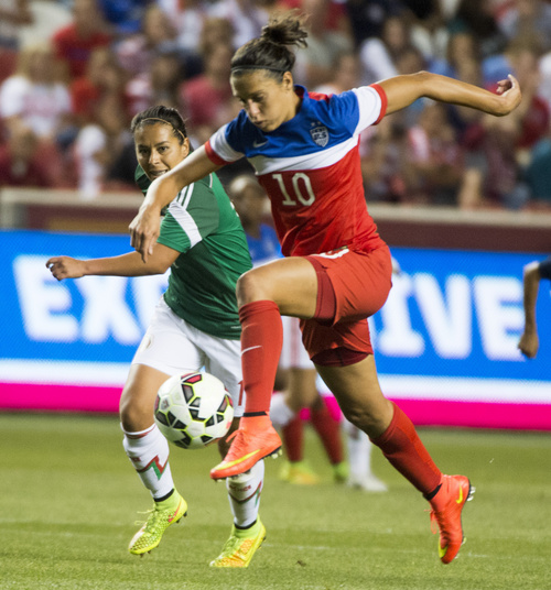 Rick Egan  |  The Salt Lake Tribune

Carli Lloyd (10) brings the ball down field for the U.S. Women's team, in Soccer action, U.S. Women's National Team, vs. Mexico, Saturday, September 13, 2014