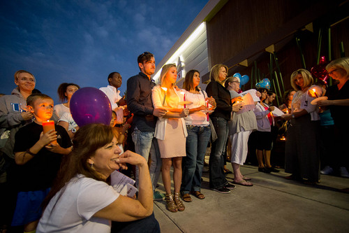Trent Nelson  |  The Salt Lake Tribune
Susan Hunt, lower left, listens to stories about her son, Darrien Hunt, at a candlelight vigil Sunday September 14, 2014 for Darrien, who was shot and killed by Saratoga Springs police.