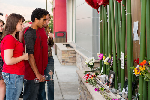 Trent Nelson  |  The Salt Lake Tribune
Family and friends at a memorial to Darrien Hunt Sunday September 14, 2014 at the Saratoga Springs Panda Express, where Hunt was shot and killed by police.
