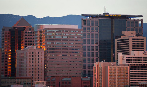 Lennie Mahler  |  The Salt Lake Tribune
Sunlight reflects from buildings in the downtown Salt Lake City skyline at sunset Aug. 15, 2013.
