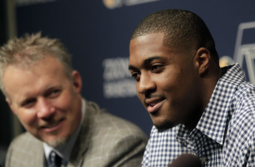 Al Hartmann  |  The Salt Lake Tribune
The Utah Jazz announce a multi-year contract extension for power forward Derrick Favors during a press conference Monday October 28, 2013 in Salt Lake City. Jazz owner, Greg Miller, is at left.