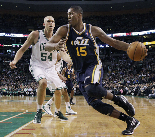 |  AP file photo

Utah Jazz forward Derrick Favors (15) drives against Boston Celtics center Greg Stiemsma (54) in the first half of an NBA basketball game in Boston, Wednesday, March 28, 2012.
