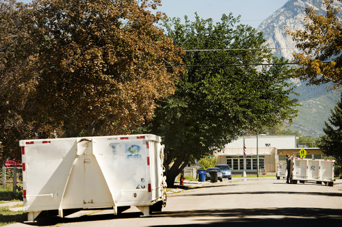 Rick Egan  |  The Salt Lake Tribune

Wasatch Front Waste and Recycling District dumpsters line Hibiscus Ave, in White City, Thursday, September 11, 2014.