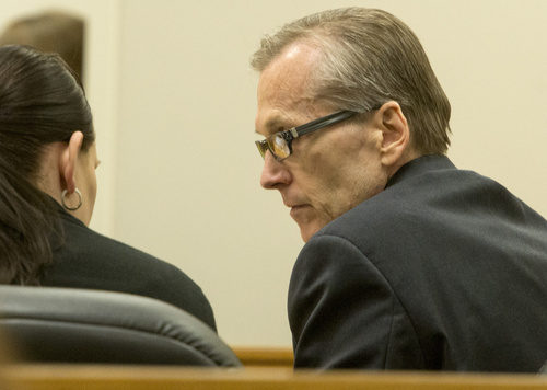 Rick Egan  |  The Salt Lake Tribune

Defense attorney, Kara North, talks to  Martin MacNeill, during a break in his trial on forcible sexual abuse, in 4th District Judge Samuel McVey's courtroom, in Provo, Wednesday, July 2, 2014