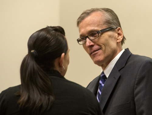 Rick Egan  |  The Salt Lake Tribune

Defense attorney, Kara North, talks to  Martin MacNeill, during a break in his trial on forcible sexual abuse, in 4th District Judge Samuel McVey's courtroom, in Provo, Wednesday, July 2, 2014