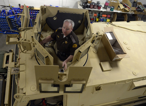 Rick Egan  |  Tribune file photo 

Lt. Alex Lepley stands inside a mine-resistant vehicle (MRAP)  is being fixed up for duty at the UHP maintenance shop in Taylorsville, Monday, January 13, 2014.