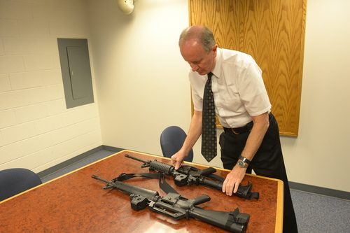 Rick Egan  |  Tribune file photo 

Granite School District Police Chief Randy Johnson with one of the M-16s he received from the U.S. Department of Defense. Thursday, February 20, 2014.