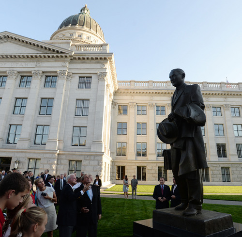 Steve Griffin  |  The Salt Lake Tribune


A statue of Marriner S. Eccles is unveiled during a program at the Utah State Capitol in Salt Lake City, Tuesday, September 16, 2014.  Marriner S. Eccles served as Chairman of the Federal Reserve Board from November 15, 1934, through April 14, 1948. He is widely credited for ensuring the central bank remained independent from political whims and private interests and for his policies that helped turn the corner from the Depression to a prospering country. The event marks the culmination of the Marriner S. Eccles Memorial Commission.