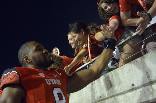 Chris Detrick  |  The Salt Lake Tribune
Utah Utes defensive end Nate Orchard (8) greets fans after the game at Rice-Eccles stadium Thursday August 28, 2014. Utah defeated Idaho State 56-14.