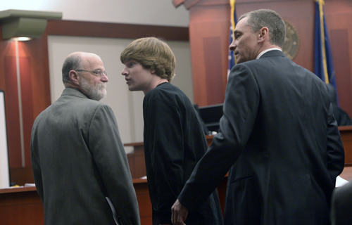 Al Hartmann  |  The Salt Lake Tribune
James Wesley Robinson, right, and his 18-year-old son Zachary Robinson wait for their initial court appearance in Salt Lake City 3rd District Court Thursday, March 13, 2014. The two and also 21-year-old son Alexander Jordan Robinson were charged with manufacturing a marijuana by-product called "Dab" or "Shatter" in a make-shift lab at their Sugar House home. Their lawyer Ron Yengich, is at left.