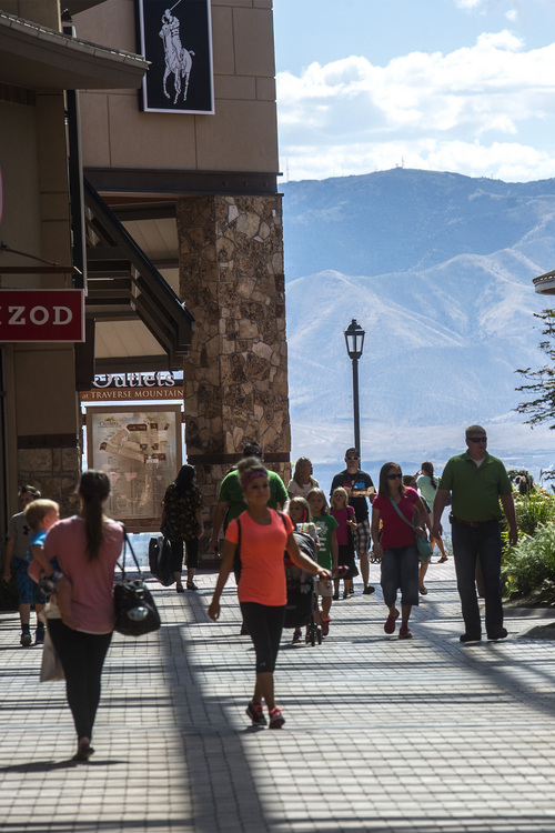 Chris Detrick  |  The Salt Lake Tribune
Shoppers walk around the Outlets at Traverse Mountain Wednesday September 17, 2014.
