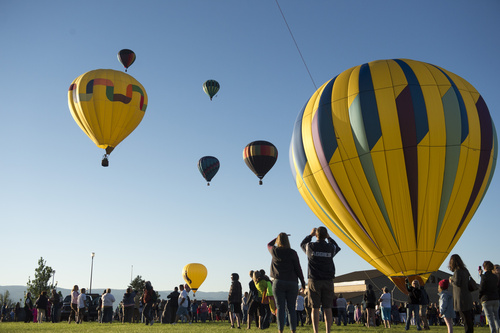 Rick Egan  |  The Salt Lake Tribune

Balloon take to the sky at the Ogden Valley Balloon & Artist Festival, Saturday, August 16, 2014.