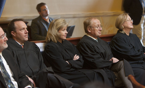 Steve Griffin | The Salt Lake Tribune


Utah Supreme Court Justices Thomas R. Lee, Jill N. Parrish, Ronald E. Nehring and Christine Durham listen to Chief Justice Matthew B. Durrant as he talks to senators about the state of the Utah judicial system during the opening of the 2013 legislative season at the Utah State Capitol in Salt Lake City Monday January 28, 2013.