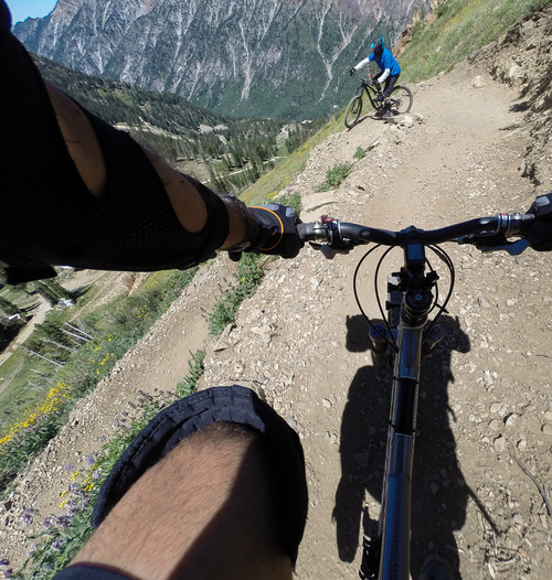 Francisco Kjolseth  |  The Salt Lake Tribune
Switchbacks, long views and a varied terrain greet visitors to Snowbird Ski and Summer Resort's newly opened Big Mountain biking trail this July. Riders can take the tram up and bike down 7.9 miles, dropping more than 2,900 vertical feet.