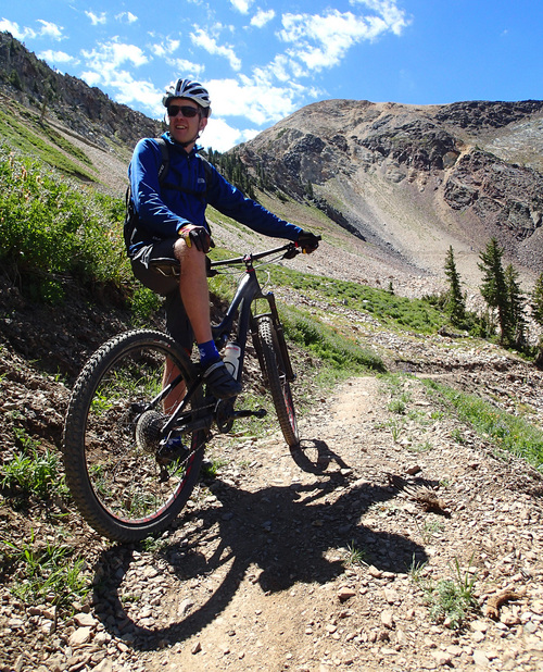 Francisco Kjolseth  |  The Salt Lake Tribune
Dave Fields, VP of Resort Operations at Snowbird Ski and Summer Resort takes a break from riding the new Big Mountain biking trail this July. Riders can take the tram up and bike down 7.9 miles, dropping more than 2,900 vertical feet.