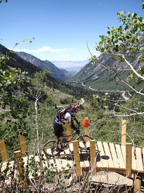 Francisco Kjolseth  |  The Salt Lake Tribune
The view from the top of Little Cottonwood Canyon is always a big draw as Snowbird Ski and Summer Resort opens their new Big Mountain biking trail this July. Riders can take the tram up and bike down 7.9 miles, dropping more than 2,900 vertical feet.
