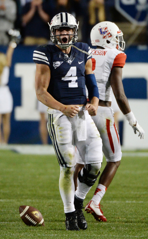 Steve Griffin  |  The Salt Lake Tribune


BYU Cougars quarterback Taysom Hill (4) screams as he celebrates his first down run that iced the game late in the second half of game between BYU and Houston and LaVell Edwards Stadium in Provo, Thursday, September 11, 2014.