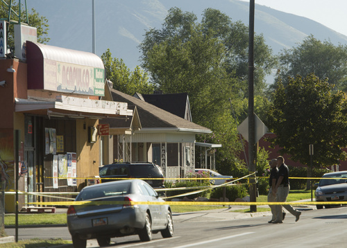 Rick Egan  |  The Salt Lake Tribune

Salt Lake City police investigate a suspicious death on the corner of Indiana Avenue and Pueblo, Thursday, September 18, 2014