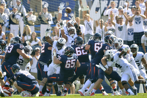 Chris Detrick  |  The Salt Lake Tribune
Brigham Young Cougars defense can't block a field goal attempt during the game at LaVell Edwards Stadium Saturday September 20, 2014.  Virginia is winning the game 16-13 at halftime.