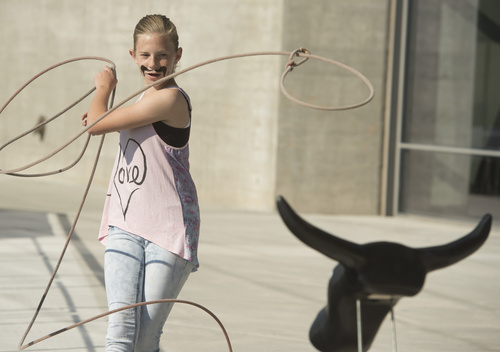 Rick Egan  |  The Salt Lake Tribune

Hailey Wall, 12, Draper, misses the lasso on the bull, at the Natural History Museum of Utah during the Cowboy Festival and BBQ, Saturday, September 20, 2014.  As part of its special exhibit, The Horse, the Natural History Museum of Utah is hosting a Cowboy Festival and BBQ this weekend with Western-themed food and fun. The festival continues Sunday from 10 a.m. to 5 p.m, with a live barbecue, live music, cowboy poetry and hands-on activities for kids.
