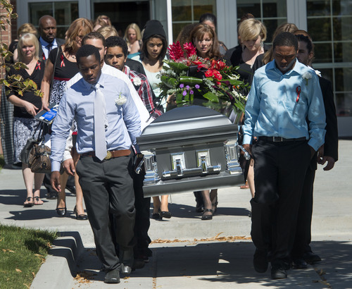 Steve Griffin  |  The Salt Lake Tribune

Family and friends serve as pallbearers as they carry the casket of Darrien Hunt following funeral services at the Saratoga Springs North Stake Center in Saratoga Springs, Utah Thursday, Sept. 18, 2014. Police officers in Saratoga Springs shot and killed Hunt on Sept. 10, 2014.