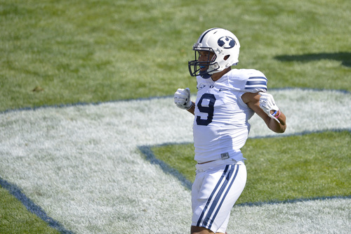 Chris Detrick  |  The Salt Lake Tribune
Brigham Young Cougars wide receiver Jordan Leslie (9) celebrates his touchdown during the game at LaVell Edwards Stadium Saturday September 20, 2014.  Virginia is winning the game 16-13 at halftime.