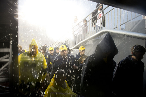 Jeremy Harmon  |  The Salt Lake Tribune

Michigan fans leave the stadium during after the suspended due to a storm as the Utes face the Wolverines in Ann Arbor, Saturday, Sept. 20, 2014.