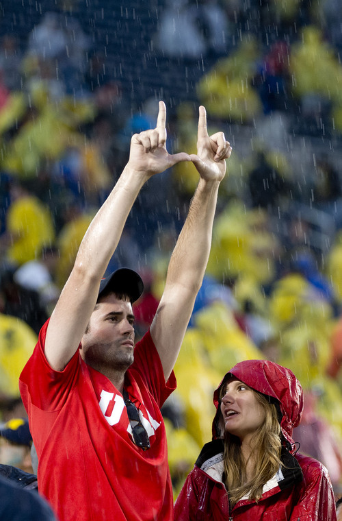 Jeremy Harmon  |  The Salt Lake Tribune

Utah fans stick it out in the rain as the Utes face the Wolverines in Ann Arbor, Saturday, Sept. 20, 2014.