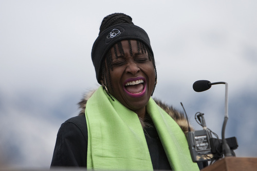 Chris Detrick  |  The Salt Lake Tribune 
Shauna Graves-Robertson sings The National Anthem during a Martin Luther King Jr. march from Sugarhouse Park to Kingsbury Hall in 2010